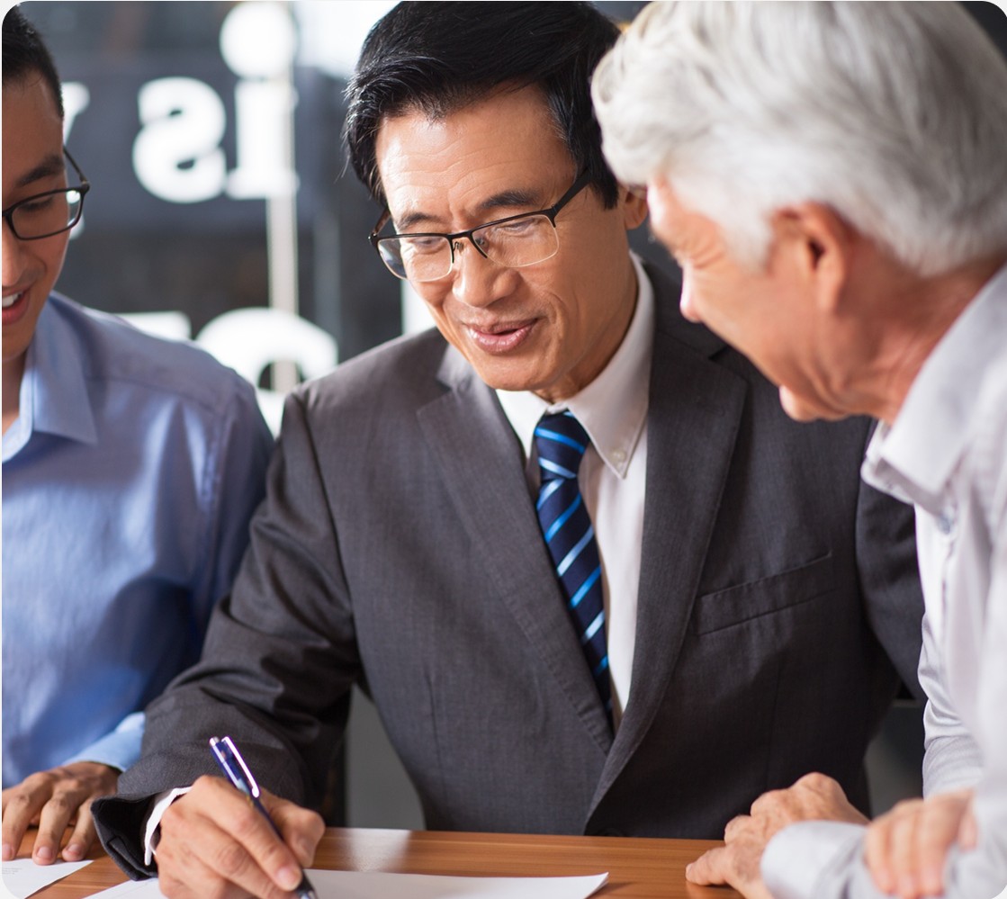 Advisors reviewing documents